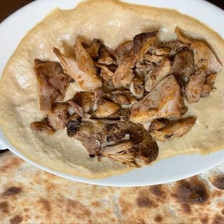 Chicken Shawarmah Over Humus